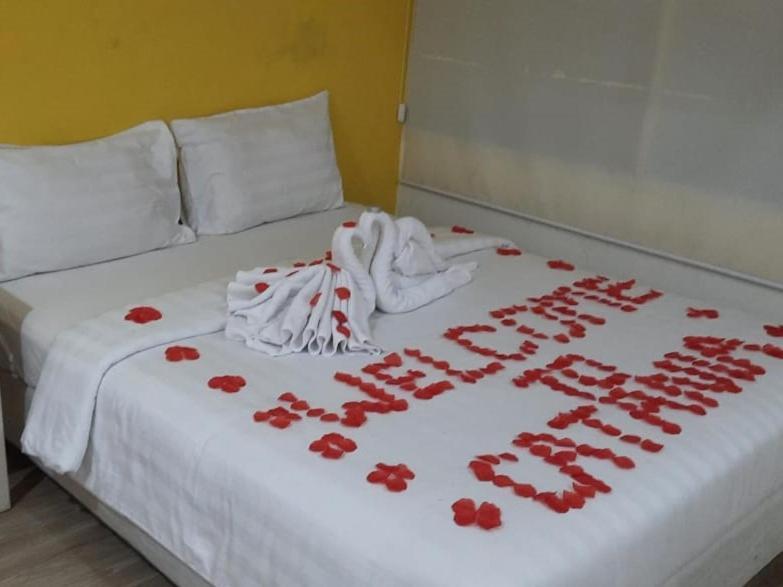 Catania Inn Palembang Bagian luar foto