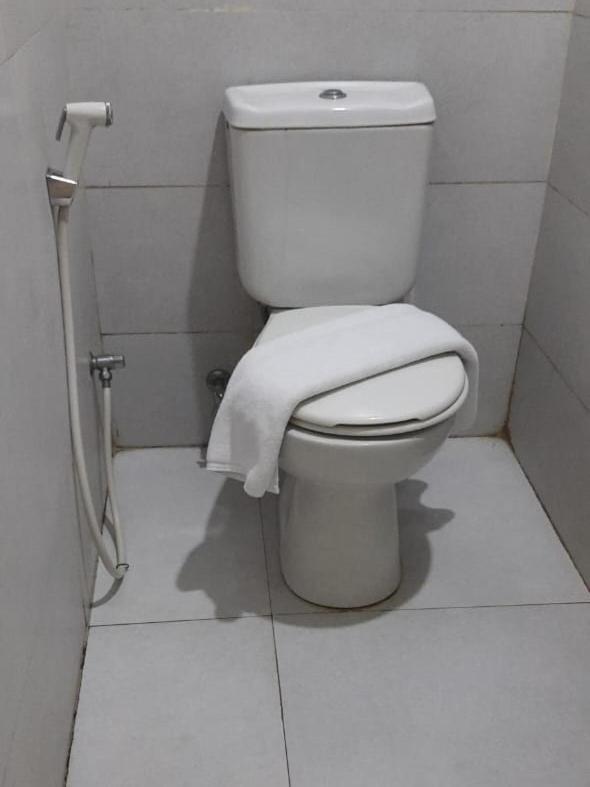 Catania Inn Palembang Bagian luar foto